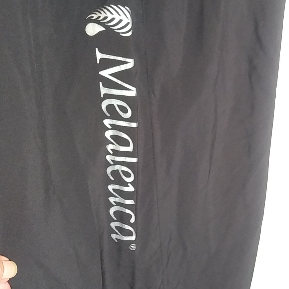 Size 2X Melalueca Logo Pants with wicking lining.